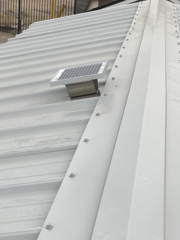 Top view of an installed Solar Metal RidgeBlaster on metal roof.